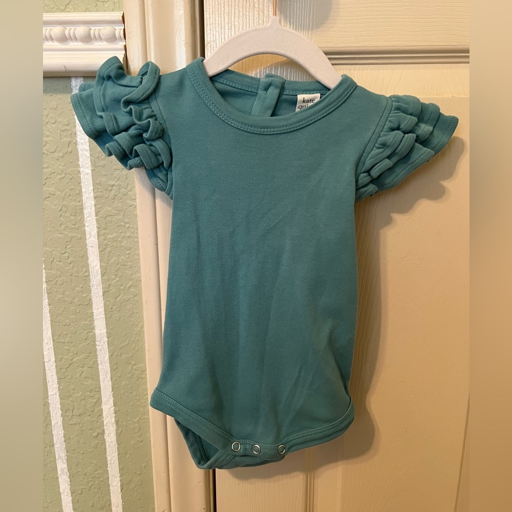 Kate Quinn triple flutter sleeve bodysuit